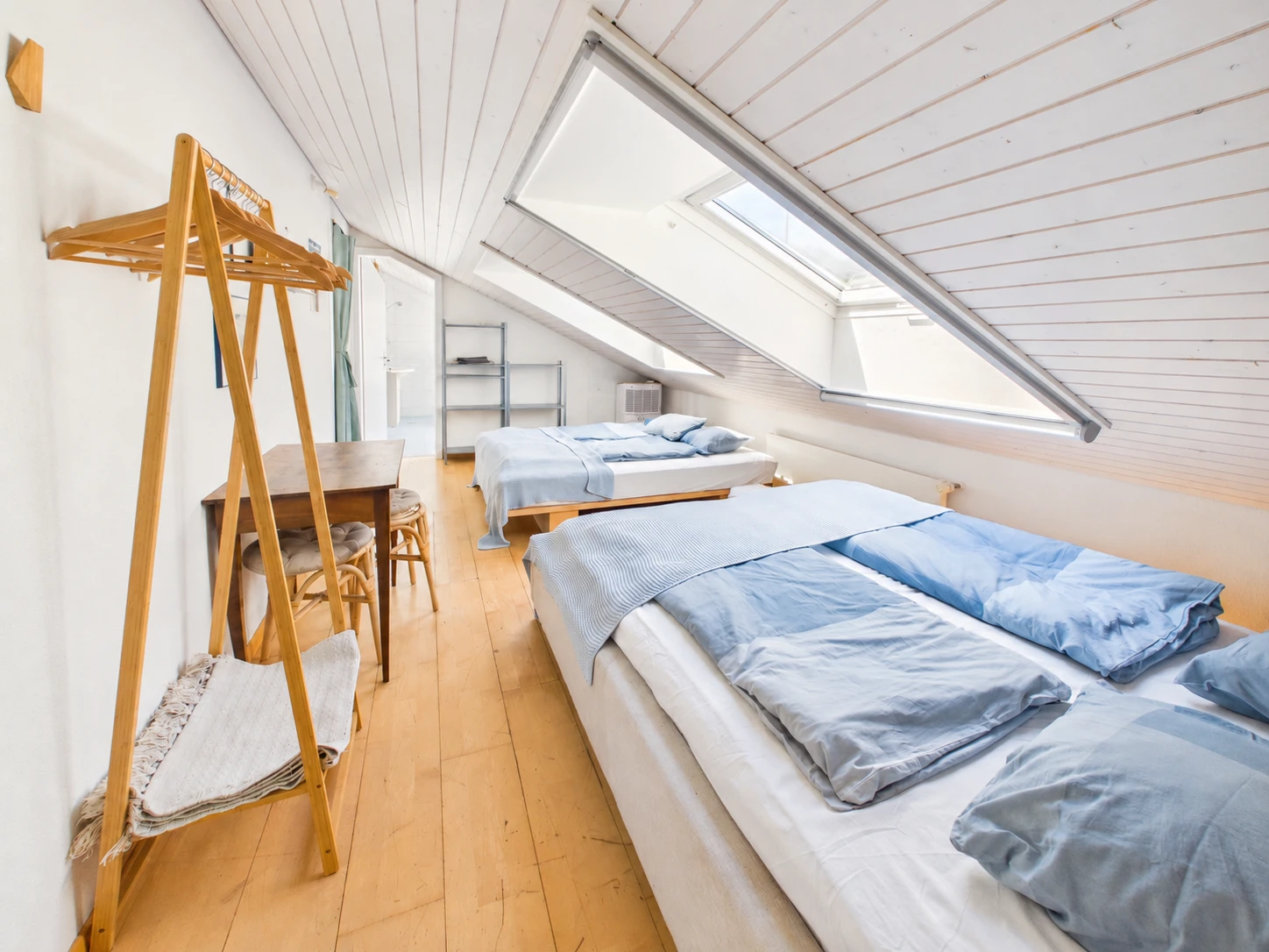 Attic bedroom with skylights